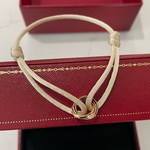 Cartier Trinity Bracelet with beige cord